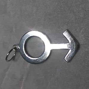Male symbol pendant in silver, hand made in Spain.